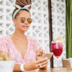 woman-enjoying-dessert-drink-cafe_273609-4017